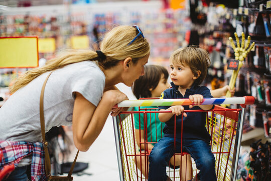 Mother with her kids shopping