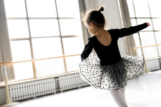 Girl practicing ballet in ballet studio