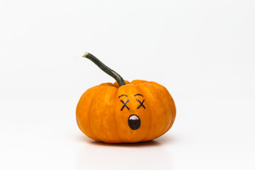 pumpkin with astonished emoticon face