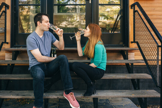 Young couple celebrating new home - Powered by Adobe