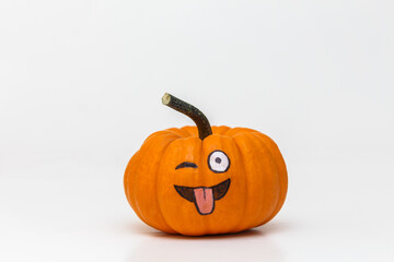 pumpkin with silly emoticon face