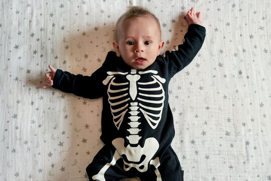 Little curious toddler in costume