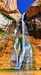 Lower Calf Creek Falls Waterfall colorful views from the hiking trail Grand Staircase Escalante...