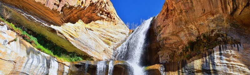 Lower Calf Creek Falls Waterfall colorful views from the hiking trail Grand Staircase Escalante...