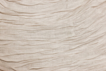 Texture softened beige linen fabric after washing