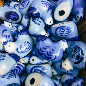 Collection of miniature ceramic chickens
