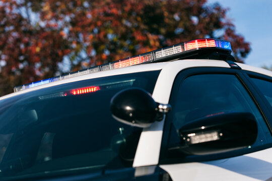 Police: Lights Flashing On Modern Police Car
