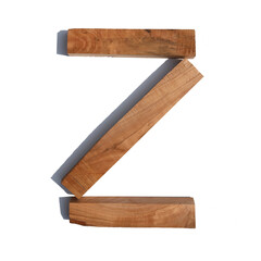 The letter Z is made of wood on a white background