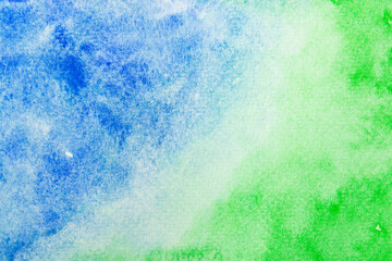 Watercolor painting on paper wallpaper. Hand painted blue and green watercolor background.