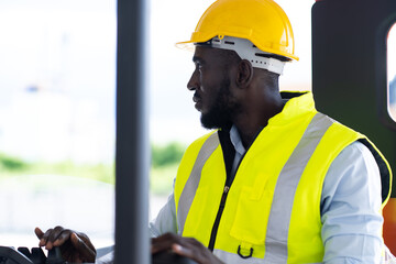 Warehouse man worker driver forklift. warehouse worker driver stacking card boxes by forklift in...