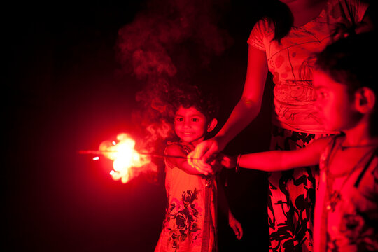 Kids and teenager enjoy and making fun with firecrackers