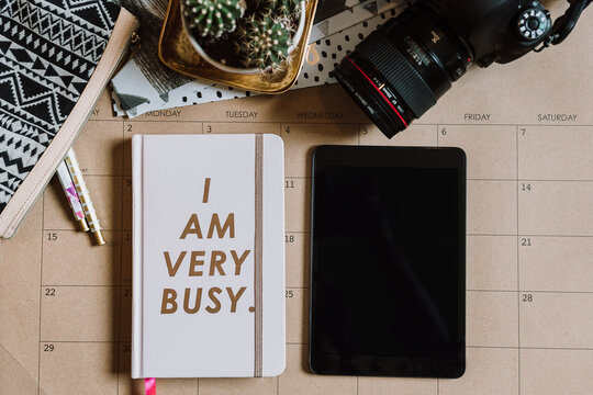 Daily planner with smart tablet and coffee