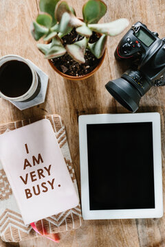 Daily planner with smart tablet and coffee