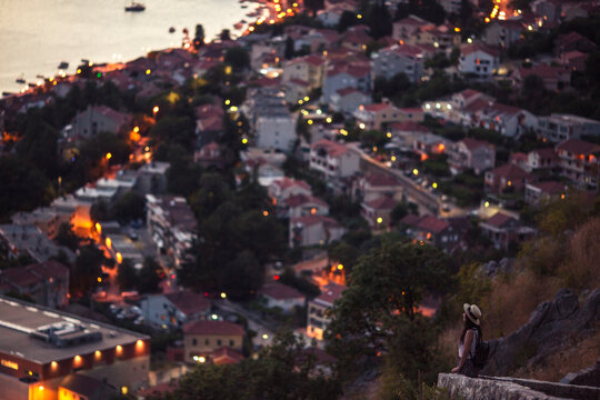 Woman looking over Kotor fortress in Montenegro