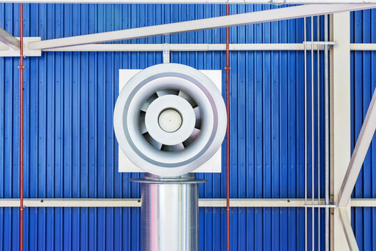 Air extractor on the ceiling of an industrial warehouse