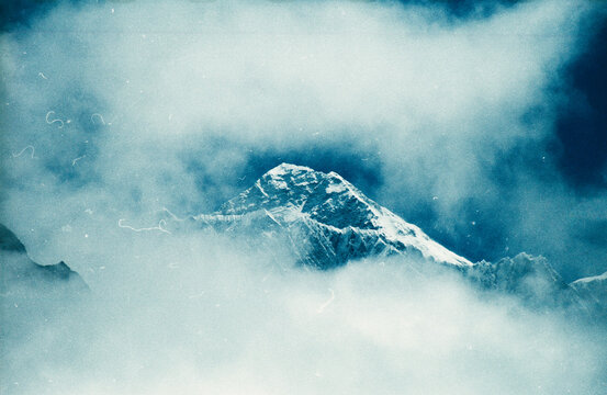Iconic Mount Everest Surrounded by Clouds Shot on Film