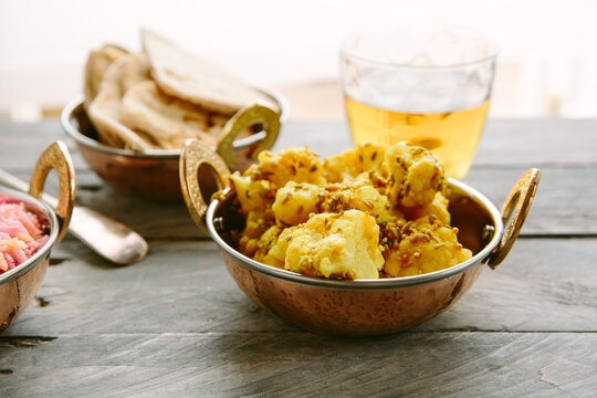 An indian dish of cauliflower cooked with whole spices