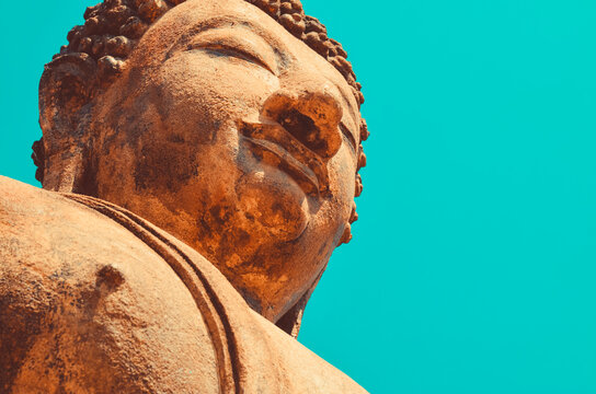 Stone carved statue of Buddha