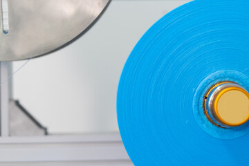 Machines are working for producing masks in a sterile factory. Production of medical masks. process of manufacturing a mask