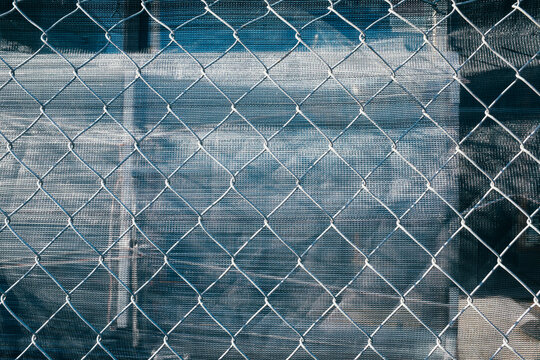 Chain-link fence in front of construction site