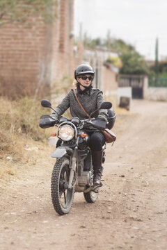 Young woman on motorbike