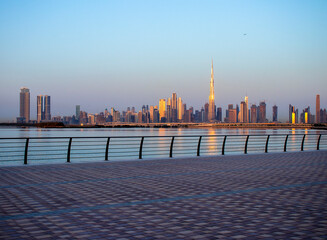 Fototapeta premium Sunrise over a skyline of a beautiful city of Dubai. Shot made in Jadaf area of the city. UAE.