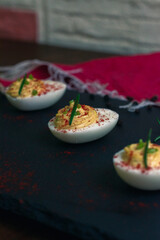 Devil Eggs with rosemary and paprika