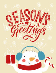Fototapeta na wymiar Season's greetings. Snowman in a hat with a gift. Great lettering for greeting cards, stickers, banners, prints and home interior decor. Xmas card. Merry Christmas and Happy new year 2021.