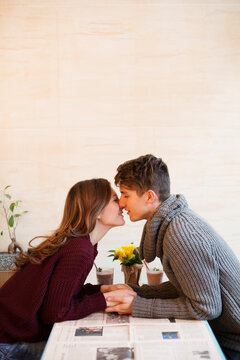 Couple in love kissing indoor