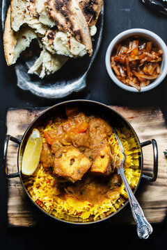 Indian meal: Chicken tika garlic chili and side dishes.