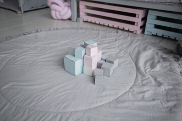 play cubes on the floor in the children's room