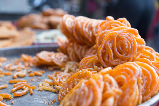 alebis (An Indian traditional sweet food) at a market stall, Delhi, India