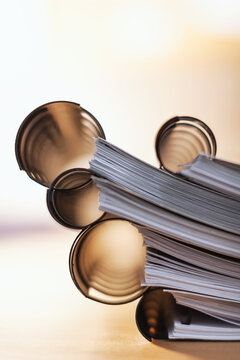 Stack of business documents in a office.