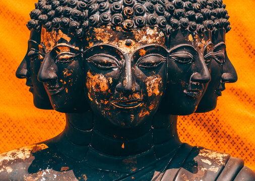 Statue of Buddha with many faces