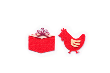 Handmade rooster and red gift with isolate white copy space, New Year, Year of rooster concept.