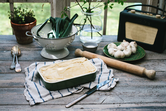 Kitchen scene with a filo pie ready for baking.
