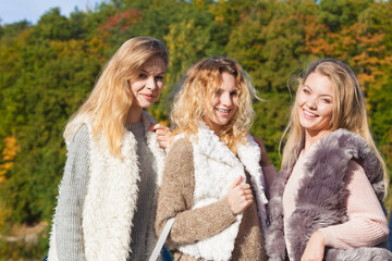 Fototapeta premium Three fashionable models outdoor