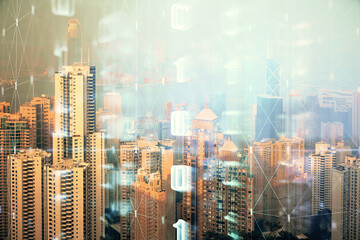 Data theme hologram drawing on city view with skyscrapers background double exposure. Technology concept.