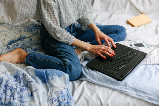 Female person working on a laptop