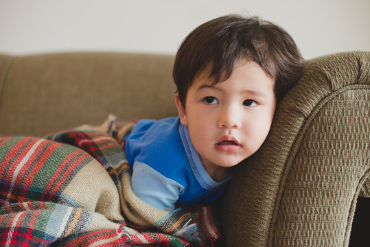 Toddler boy watching television