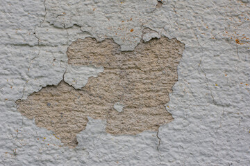 Mauer mit abgebröckelter Farbe