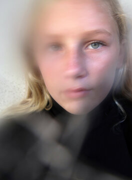 Untraditional Portrait Of Teenager With Beautiful Eyes