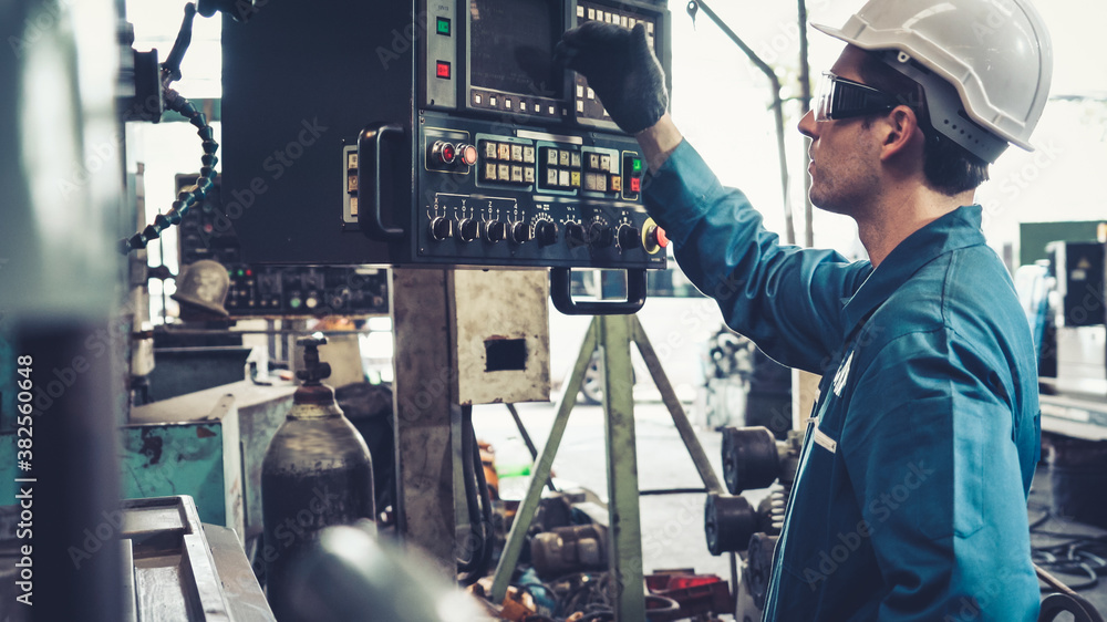Poster smart factory worker using machine in factory workshop . industry and engineering concept.