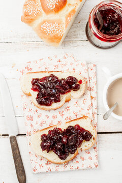 Breakfast challah with cranberry jam and coffee