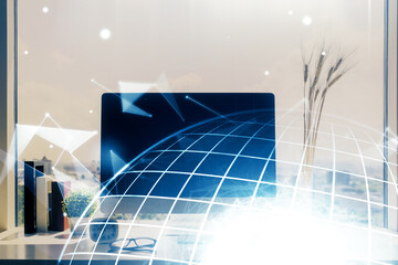 Double exposure of desktop with computer and world map hologram. International data network concept.