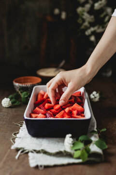 Making strawberry crumble