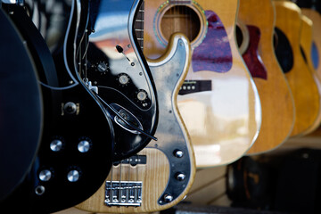 Rows of electric and acoustic guitars