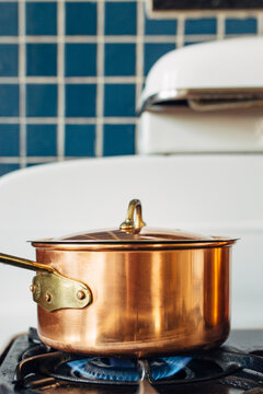 Copper pot on a retro stove