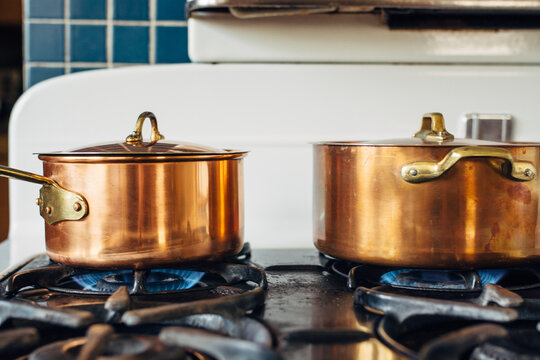 Copper pots on old stove