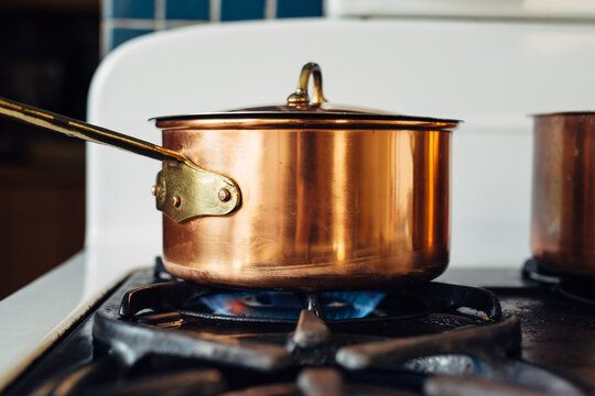 Copper pot on a stovetop